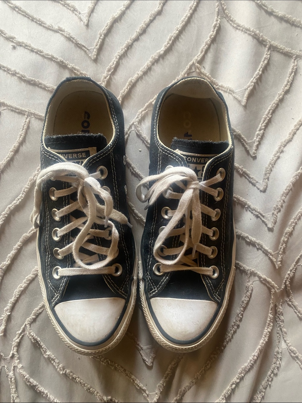 Converse Low Top Sneakers in Black and White. Women’s size 6.5, men’s 4.5